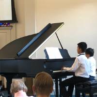 Children_playing_piano